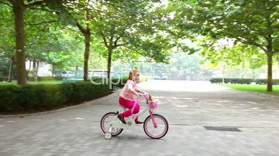 Little girl on bike