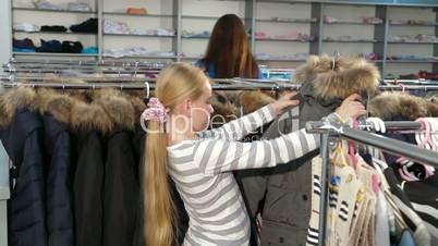 Shopping For Winter Clothes in Clothing Store