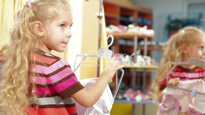 Shopping For Childrens Clothes In Clothing Store