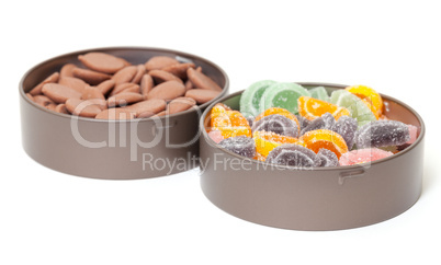 Colorful Jelly and Chocolate Candies in tin cans