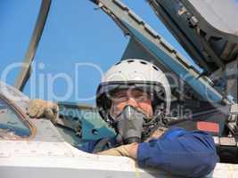 military pilot in a helmet on a aircraft
