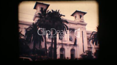 Vintage 8mm. Old casino and palm trees