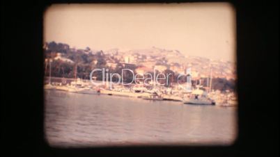 Vintage 8mm. View of port and sail boats