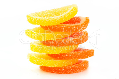 Colored marmalade (slices) on a white background