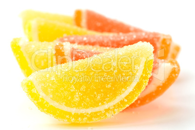 Colored marmalade (slices) on a white background