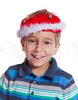 Christmas boy  in a santa claus hat. Isolate on white background