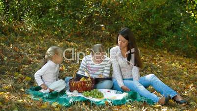 family spending time together in the autumn park