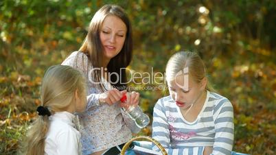 Family Spending Time Together In The Autumn Park