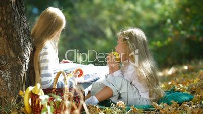 Two Little Girls In The Autumn Park