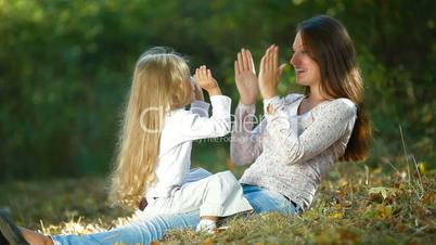 Mother and Child Playing Outdoors