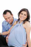 pregnant woman couple together smiling