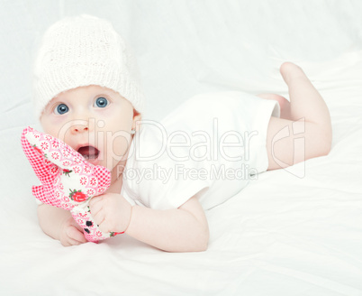 Baby Girl in Knitted Cap