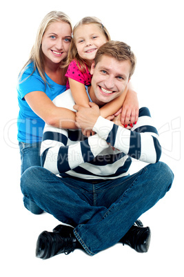 Happy young family, the adorable three