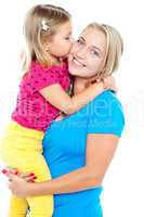Fashionable young kid kissing her mother