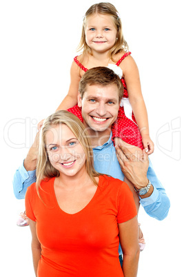 Portrait of cheerful family of three having fun