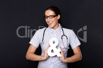 Doctor holding an ampersand symbol