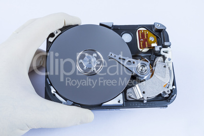 technician with open hard-disk