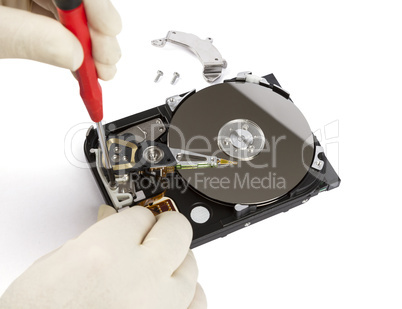 technician with open hard-disk