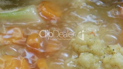 Boiling food, cauliflower, carrots, soup