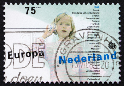 Postage stamp Netherlands 1989 Girl and String Telephone