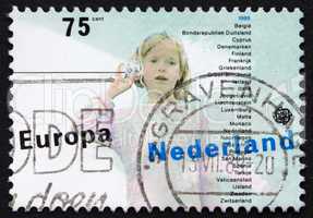 Postage stamp Netherlands 1989 Girl and String Telephone