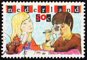 Postage stamp Netherlands 1980 Boy and Girl Inspecting Stamp