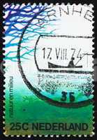 Postage stamp Netherlands 1974 Fisherman in Boat and Frog
