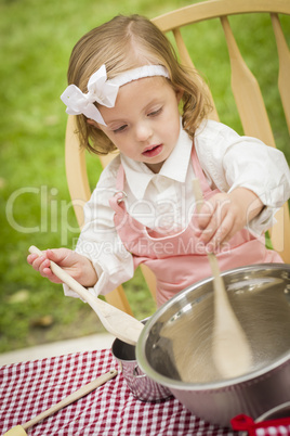 Adorable Little Girl Playing Chef Cooking