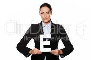 Businesswoman holding a capital letter E