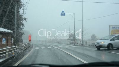 Driving through heavy snow fall