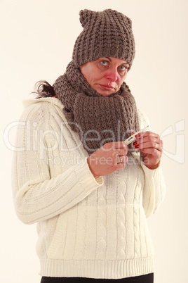 Ältere Frau mit Erkältung