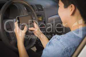 Mixed Race Woman Texting and Driving