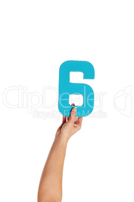 hand holding up the number six from the bottom
