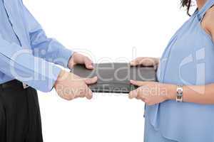 picture of two angry business person fighting for contract