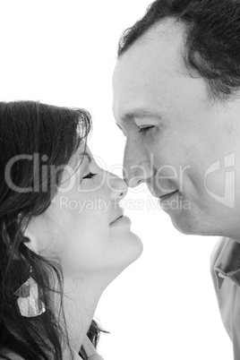 happy young couple portrait smiling isolated over a white backgr