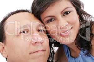Closeup portrait of a sweet young couple smiling together