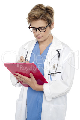 Medical practitioner writing prescription
