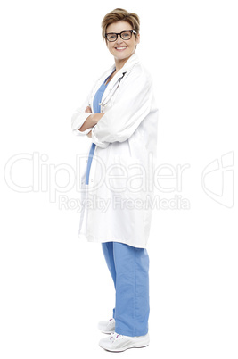 Full length portrait of a smiling female doctor