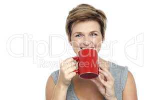 Young woman enjoying her coffee