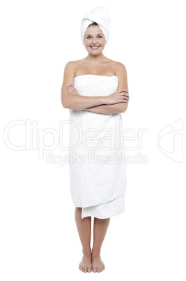 Beautiful young woman in towel after shower