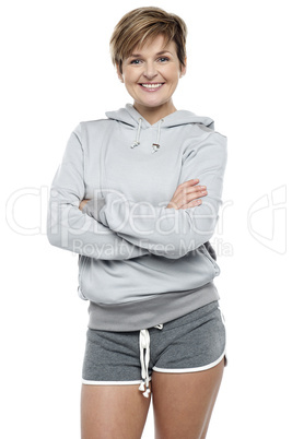Attractive lady wearing winter sweater and shorts