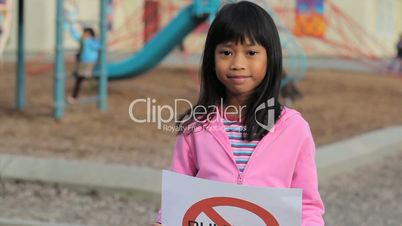 Cute Asian Girl With Large NO BULLYING sign