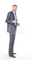 Full length portrait of cheerful business man with glass wine