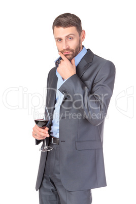 Portrait of thoughtful business man with glass wine