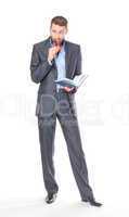 Full length portrait of thoughtful business man with diary
