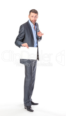 Full length portrait businessman showing an empty board to write