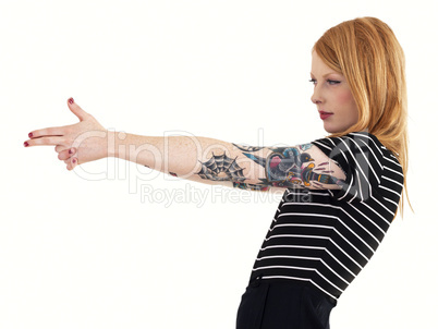 Red Head Pretending to Aim and Shoot with Arm Covered in Tattoos