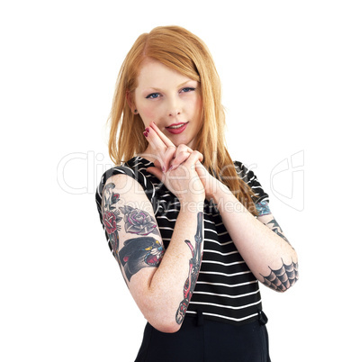 Red Head Looking Sultry at Camera with Hands in Shape of a Gun w
