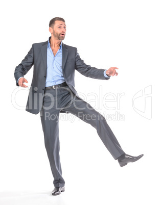 Full length portrait dancing businessman