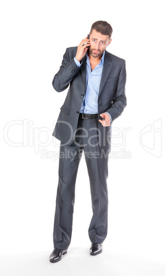 Full length portrait businessman with mobile phone